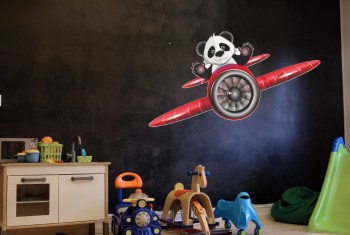 Wandtattoo Flugzeug mit wagemütigem Panda